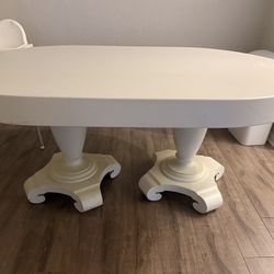 Oval white table with gray veins