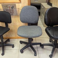 Three Rolling Chairs