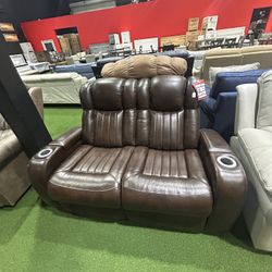Brown Leather Loveseat  Automatic Recliner 