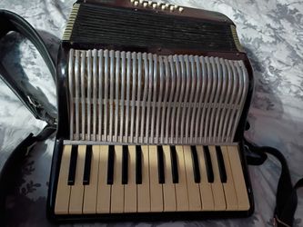 Small accordion in good shape .ready to play