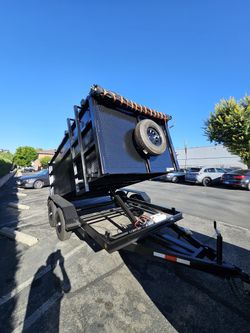 NEW DUMP TRAILER 12x8x4 12000 LBS
ROLLING TARP--SPARE TIRE,ELECTRIC BRAKES,HYDRAULIC SYSTEM,REMOTE CONTROL,IDEAL FOR HAULING, DEMOLITION, TRASH ETC,