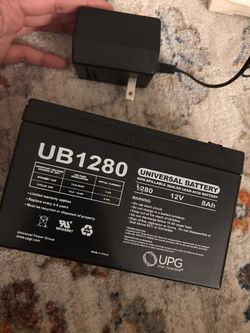 Universal battery with adapter to charge