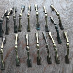 16 Cabinet Handles. 