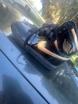 Jordan 1s black and gold
