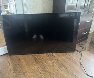 65” TCL 4K Roku Smart TV