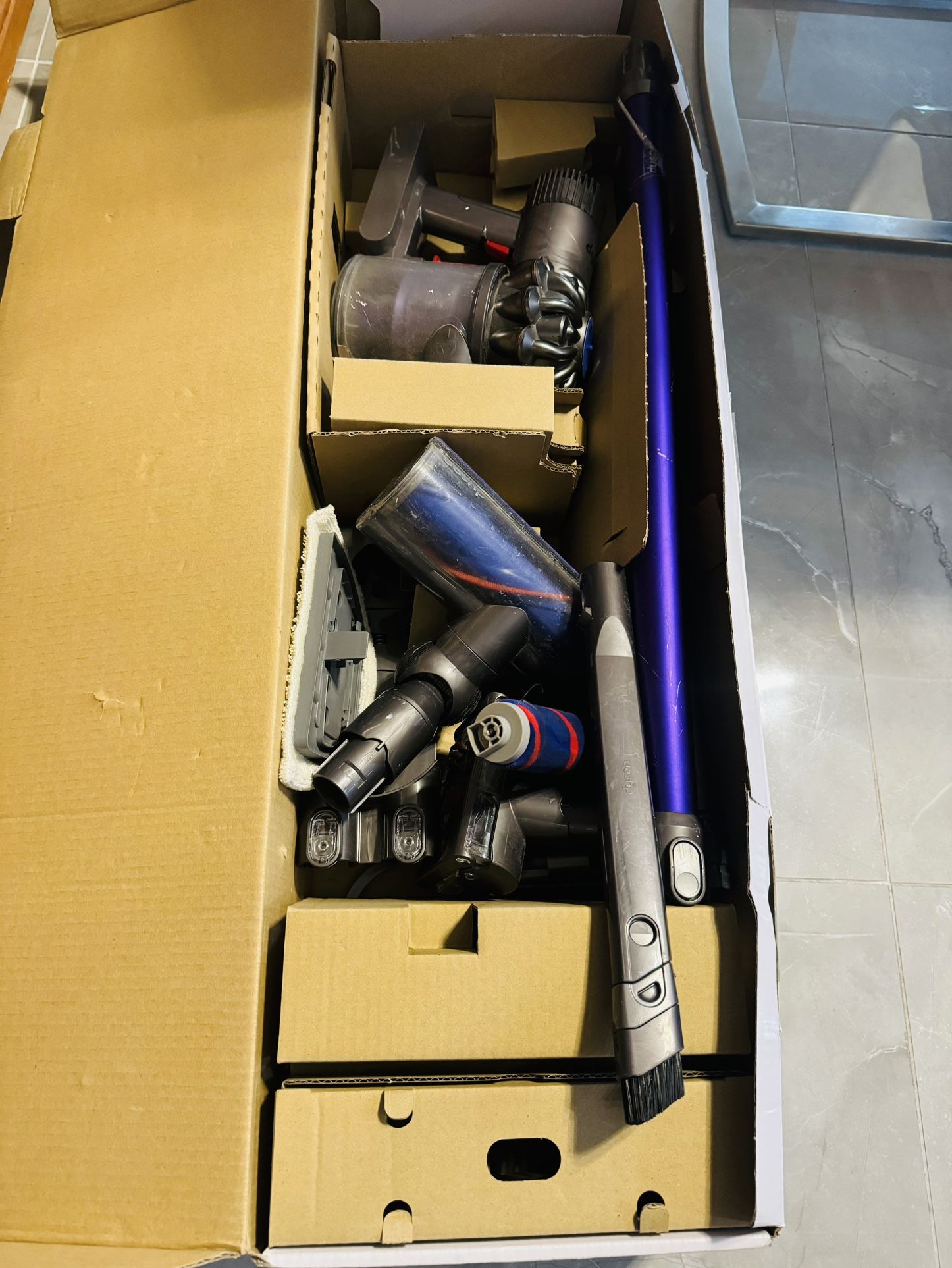 DYSON V6 Vacuum Comes With All The Attachments
