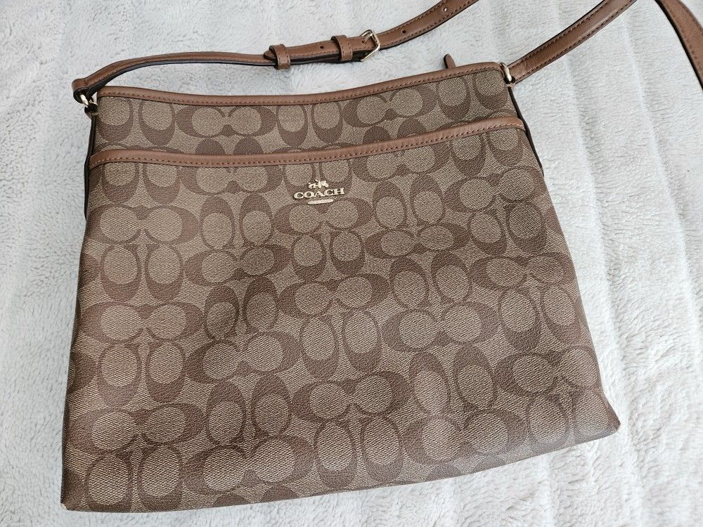 Coach leather messenger bag. With wallet