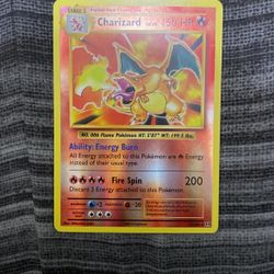 Charizard card from the 2016 XY Evolutions set (#11/108) 