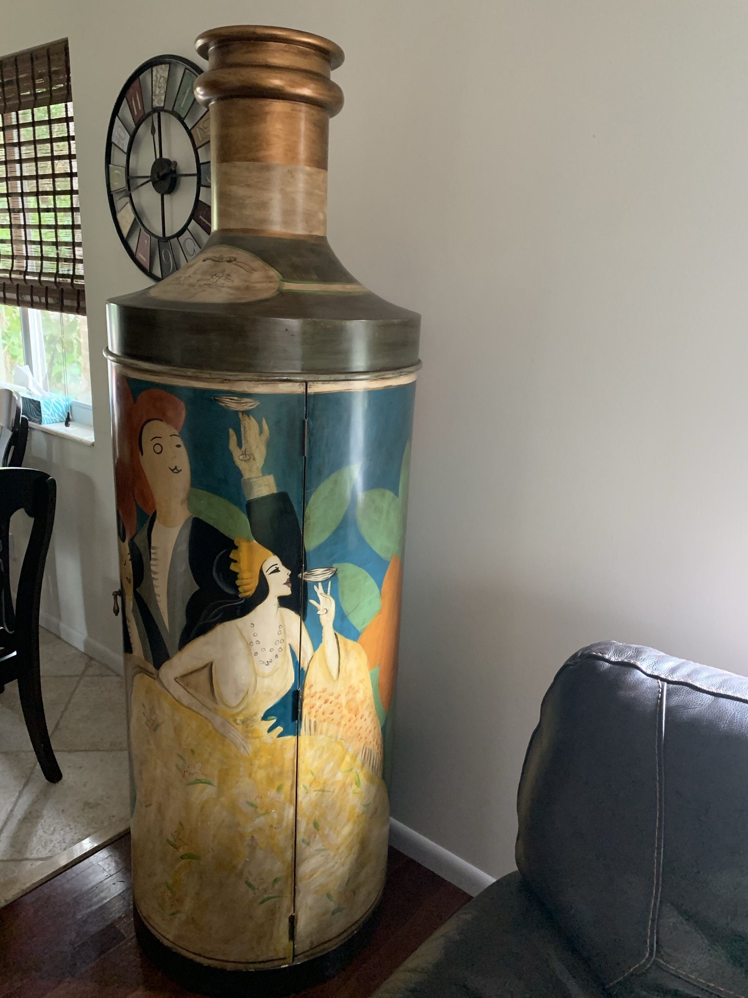 Handcrafted Bottle Shaped Antique Liquor Cabinet Size 75” H 76” circumference $500