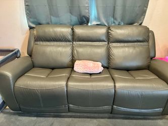 dark gray leather reclining sofa