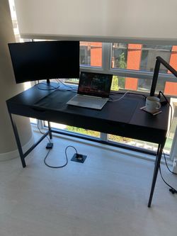 IKEA ALEX desk in black/brown with 2 built-in drawers. $50 — priced for a quick sale.
