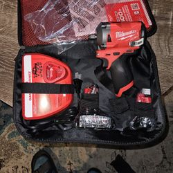 Milwaukee M12 3/8 stubby Impact wrench With 2 Batteries Brand New 