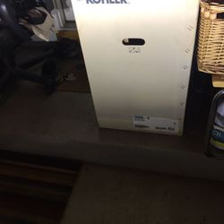 NEW   TOILET - KOHLER REACH