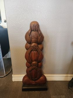 Wood totem pole with 3 wise monks