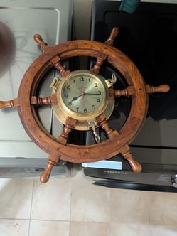 Boat's helm wall clock