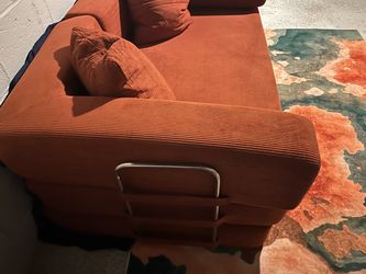 Orange Corduroy Sofa with Pull-Out Mechanism