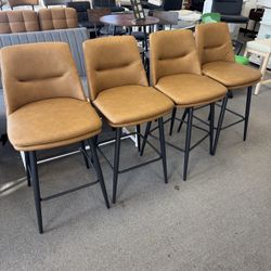 Brown Counter Height Bar Stools Set of 4 Seat height: 26 inches With backrest & metal legs 360° swivel, upholstered faux leather Brand new, fully asse