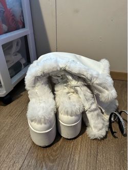 White fur boots