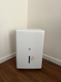 White GE Dehumidifier