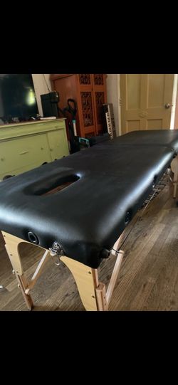 Massage table