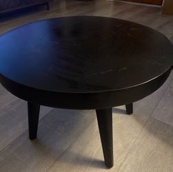 Black round coffee table