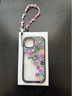 Casetify iPhone 15 case and charm
