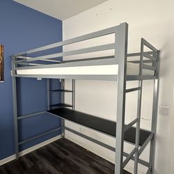 Twin bed with desk under