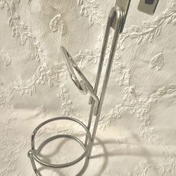 Over cabinet hair dryer rack