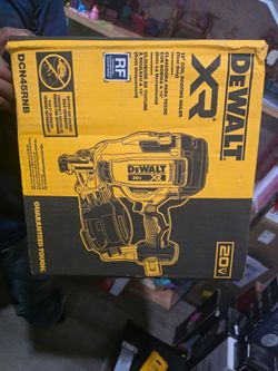 New Dewalt roofing gun plus 2 dewalt batterys