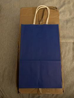 Box of Kraft bags with 48 pieces. Brand new. Color Blue 