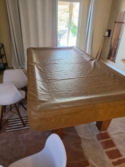 Pool table with cover