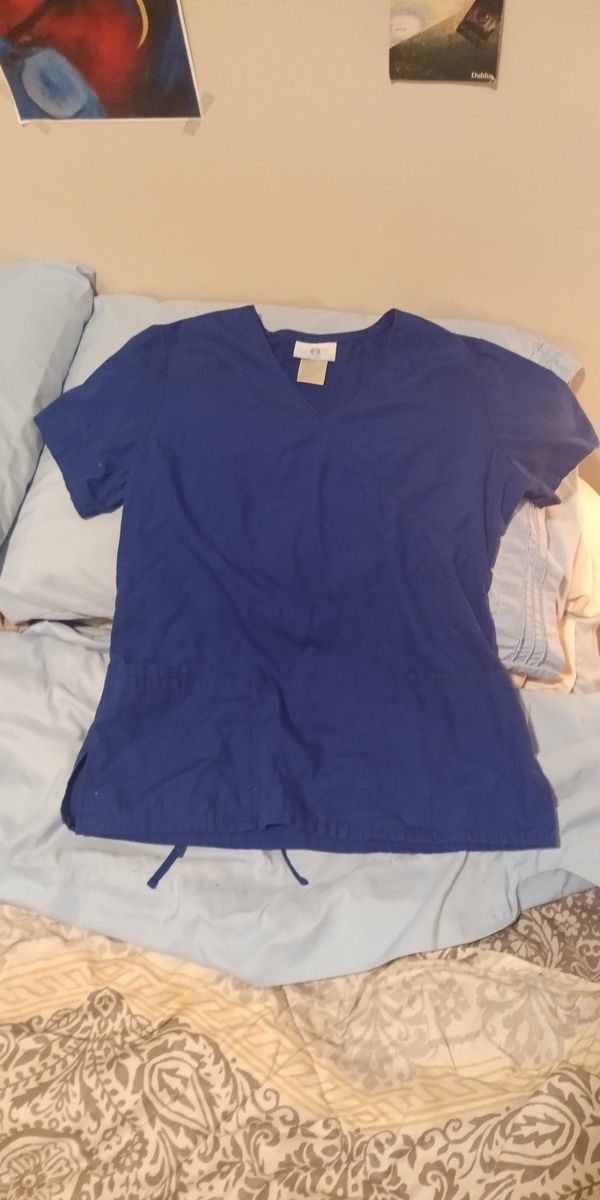 Electric blue scrub top, size medium w/drawstrings in back for Sale in