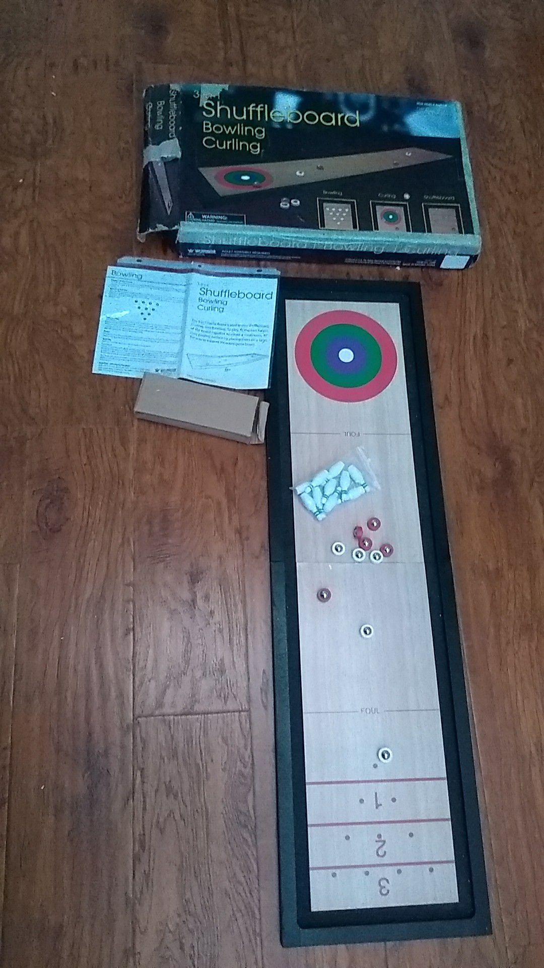 Shuffle board , bowling, curling ,3 games comes with instructions how to play the games!!