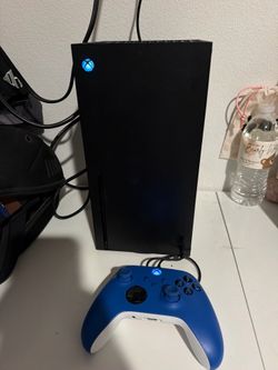 Xbox Series X with blue controller