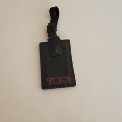 Tumi Black Leather Luggage Name Tag with Buckle Size 4"x2.5". Pre-owned, 
very good shape, please see photos for details