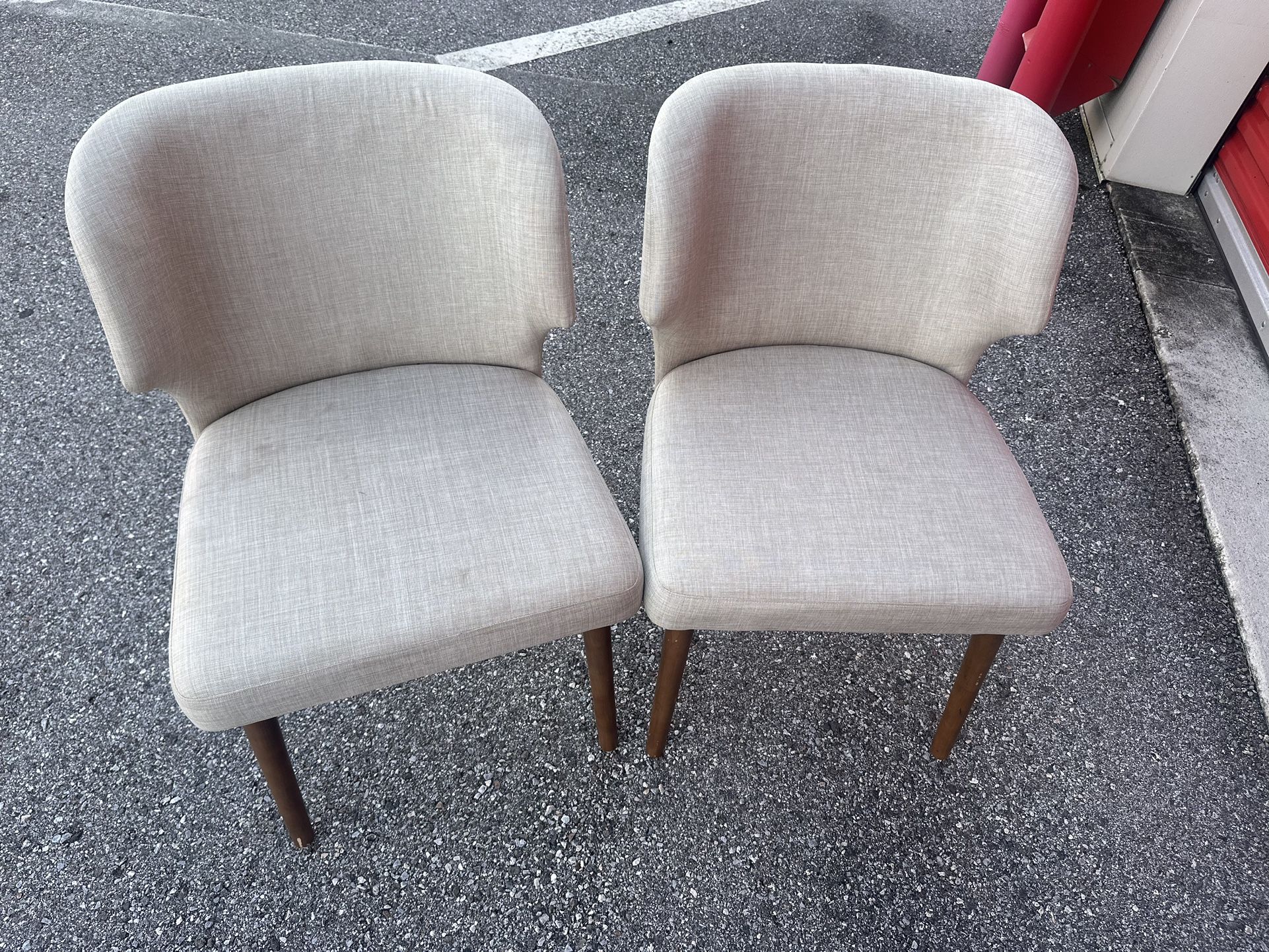 Beige :Two very nice matching chairs , linen feel , soft and sturdy. Pet free smoke free