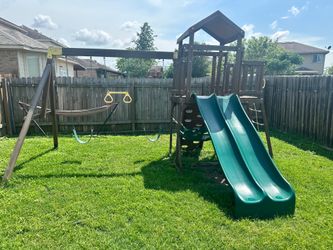 Kids backyard playscape and swing