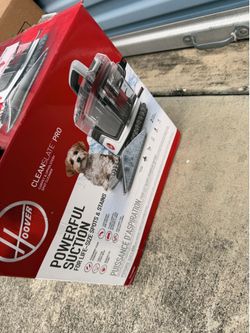 Water based carpet vacuum