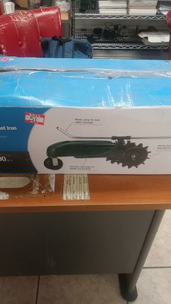 Orbit travelling cast iron sprinkler