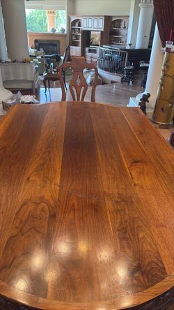Gorgeous Carved Dining room and 6 leather chairs