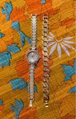 Woman’s Sparkling Gold Tone Watch and Matching Bracelet