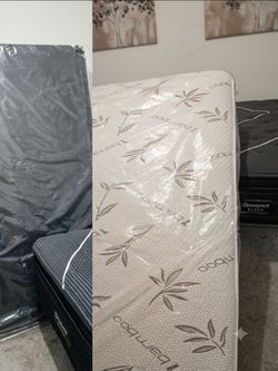 Brand New Queen Mattress, Box Spring. And queen frame included