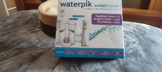 Waterpik ultra Plus water flosser portable cordless with rechargeable cord if you want