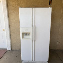 Kitchen Aid side by side refrigerator in great working condition. Everything works--