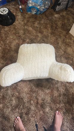 White reading pillow