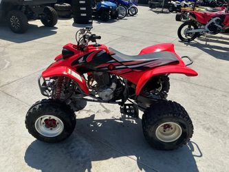 Mechanic special 1999 Honda trx400ex Missing ignition switch and battery. It will start with a jumper box and starting fluid so it will need the car c