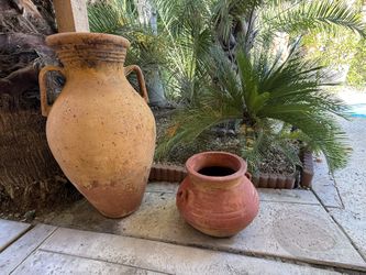 Extra large terracotta European Turkish amphora or olive jar .