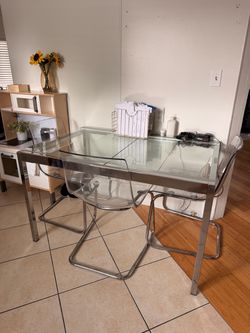 Glass table with 3 chairs