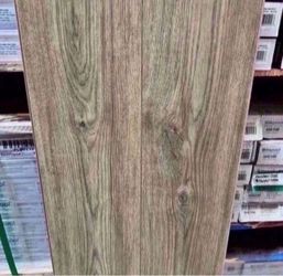 TrafficMaster - Tully River Oak 7 mm T x 7.56 in. W Water Resistant Laminate Flooring (26.56 sq.ft./case)