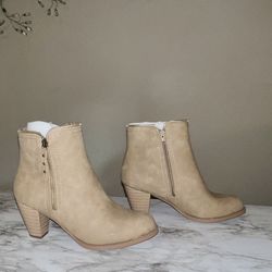 New unworn taupe ankle length boots with zipper accents & 3 inch heel